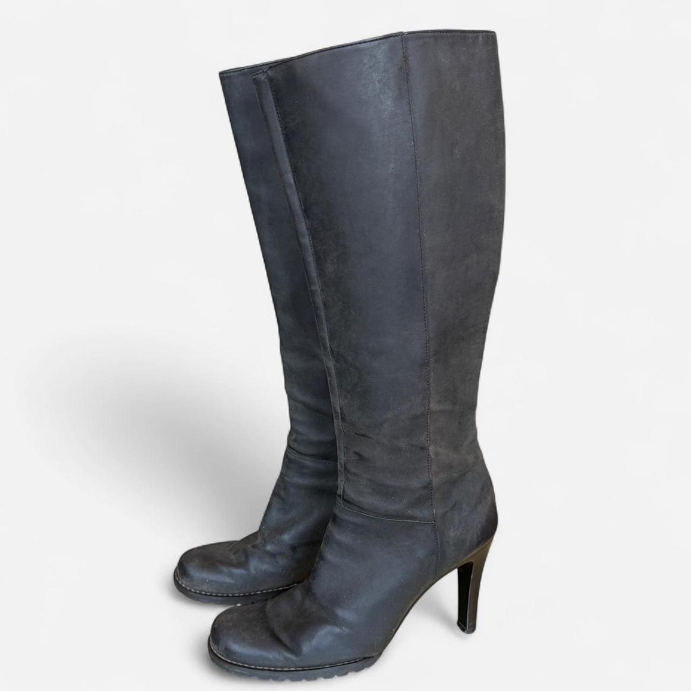 Black Gianni Bini leather knee-high boots with round toe tread and stiletto heel